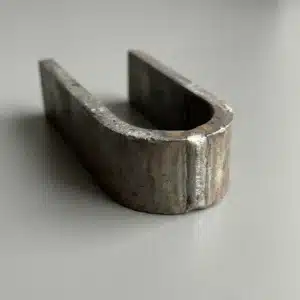 Steel bend-test strip bent into a U at the weld, without cracks
