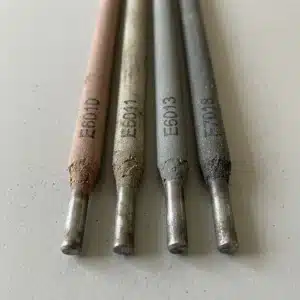 Close-up of stick rods printed E6010, E6011, E6013 and E7018